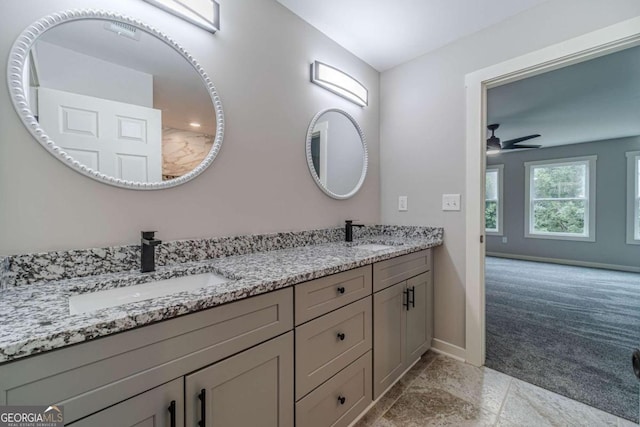 bathroom with vanity and ceiling fan