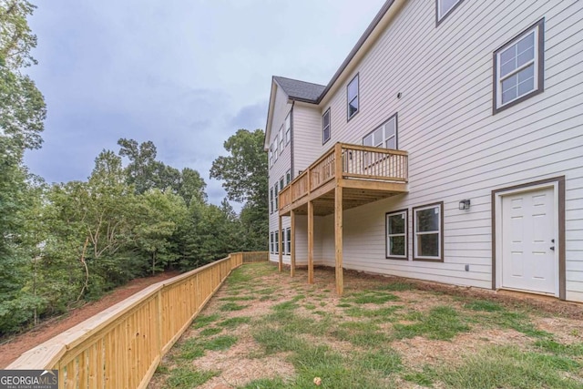 view of yard featuring a wooden deck