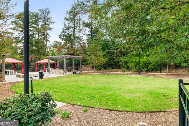 view of yard featuring a pergola and a gazebo