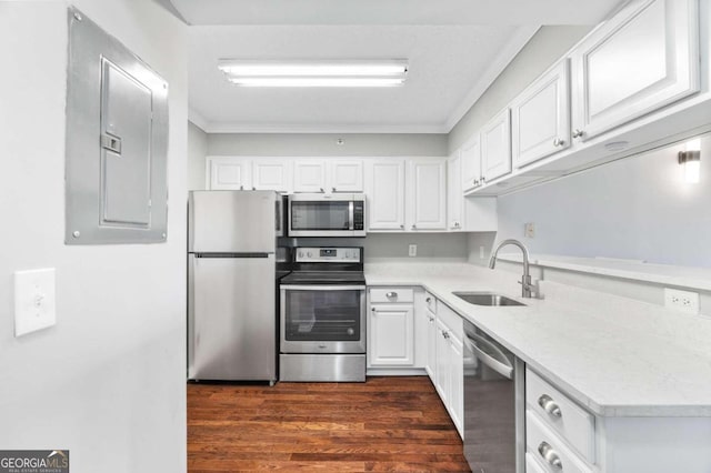 kitchen with white cabinetry, sink, and appliances with stainless steel finishes