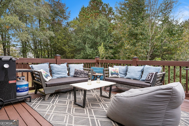 wooden deck featuring outdoor lounge area