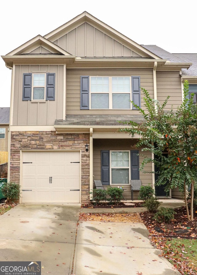 townhome / multi-family property featuring a garage