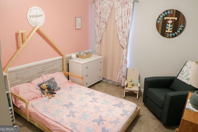 bedroom featuring light carpet