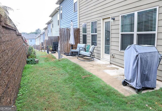 view of yard with a patio area