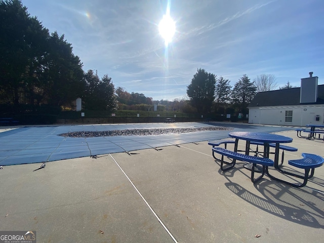 view of pool featuring a patio