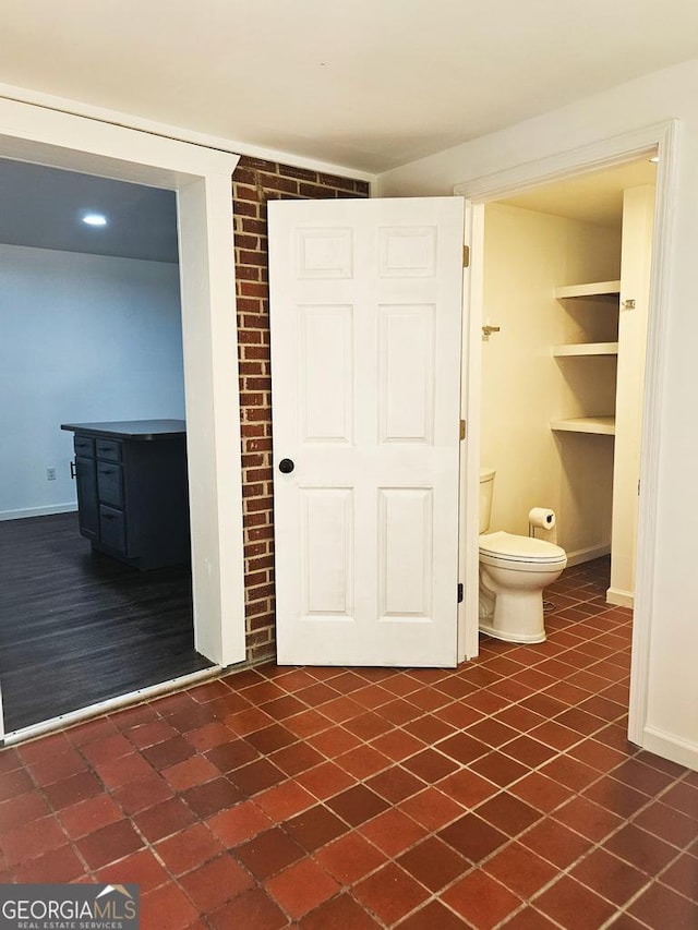 bathroom featuring toilet