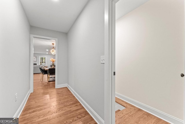 hallway featuring light hardwood / wood-style floors