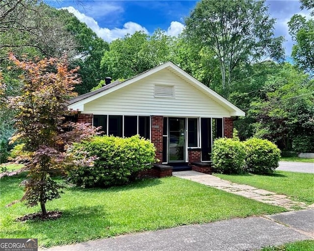 view of front of home with a front yard