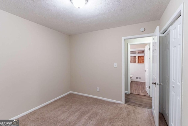 interior space with a textured ceiling