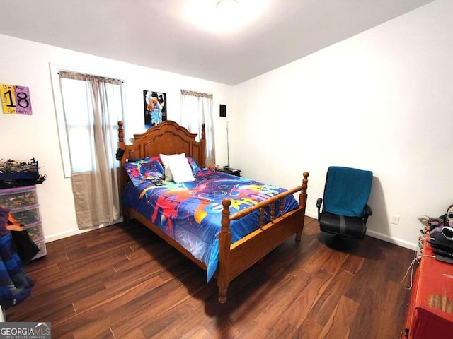 bedroom featuring dark hardwood / wood-style floors