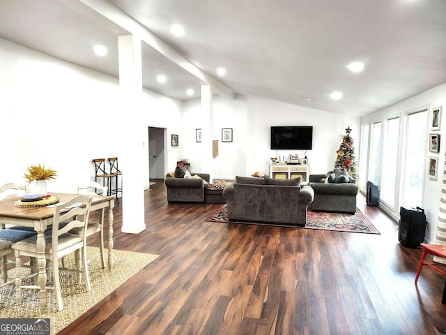 living room with lofted ceiling and dark hardwood / wood-style floors