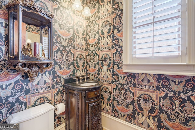 bathroom with vanity and toilet