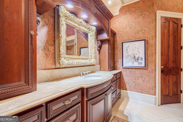 bathroom with vanity, tile patterned floors, and ornamental molding