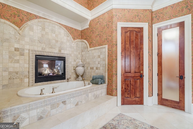 bathroom featuring tiled bath, tile patterned flooring, and crown molding