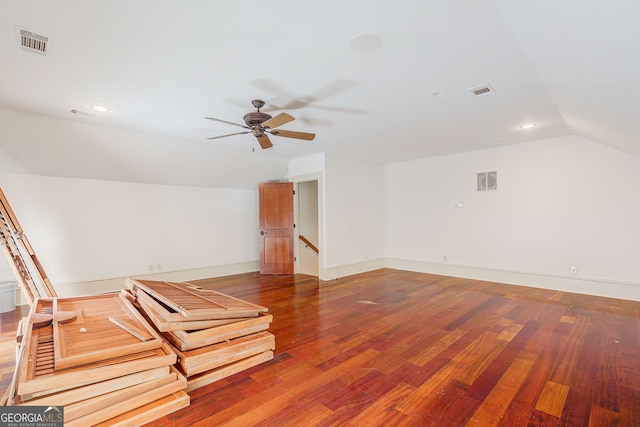 bonus room with dark wood-type flooring, ceiling fan, and lofted ceiling