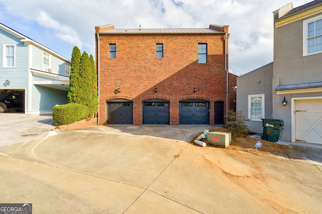 exterior space with a garage