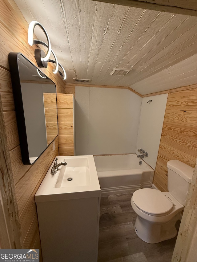 bathroom featuring vanity, wood-type flooring, wooden ceiling, toilet, and wood walls