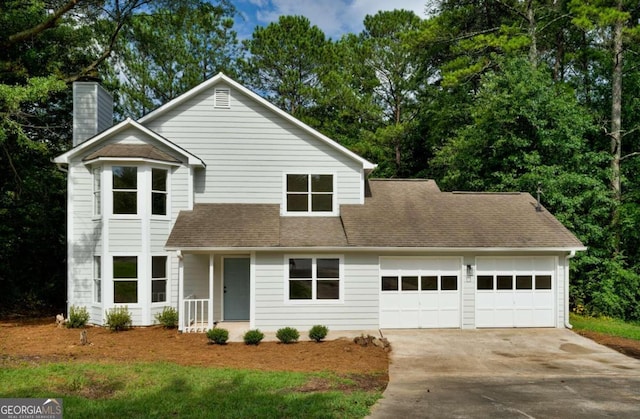 view of front of home with a garage