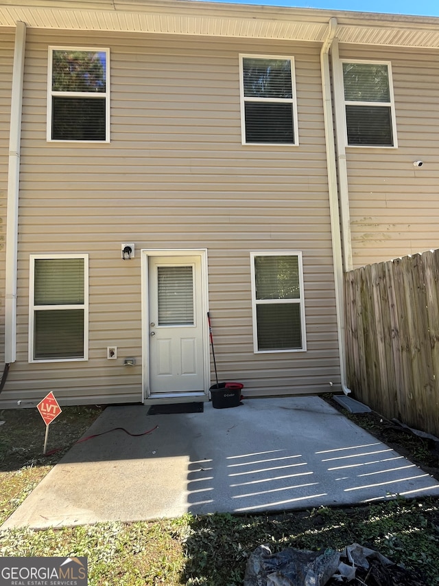 rear view of house with a patio area