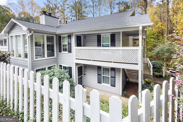 view of front of home with a balcony