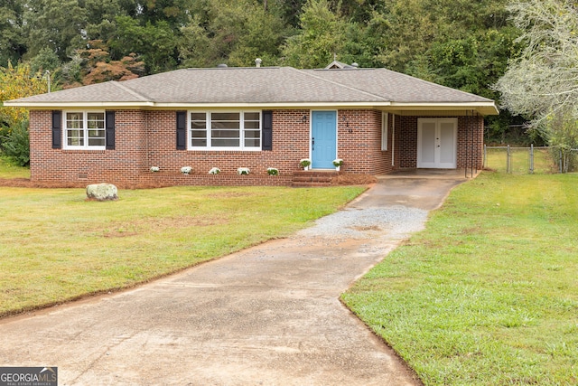 ranch-style home with a front lawn and a carport