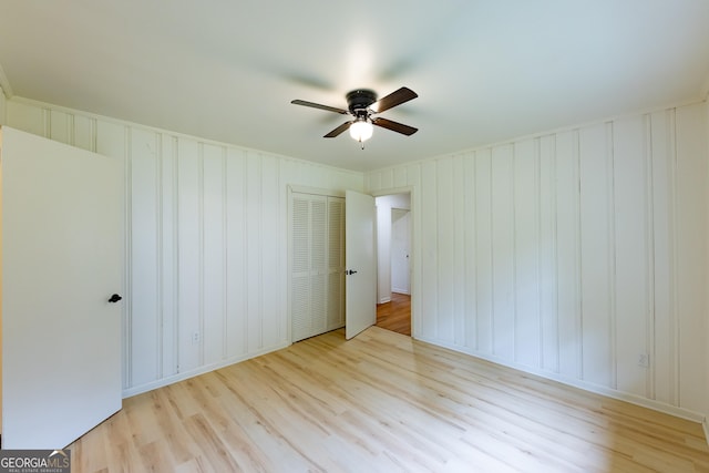 empty room with light hardwood / wood-style floors