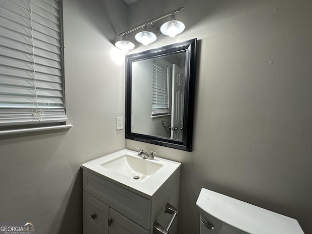 3168 Mcafee Rd, Decatur, GA 30032 - half bathroom with vanity and toilet