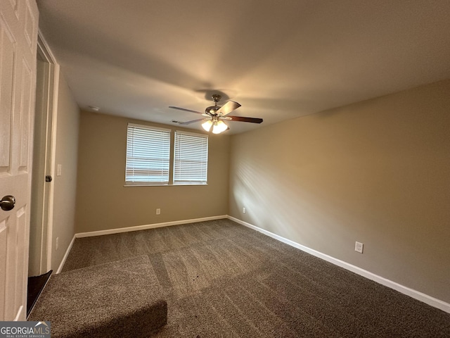 3168 Mcafee Rd, Decatur, GA 30032 - empty room featuring ceiling fan, dark colored carpet, and baseboards