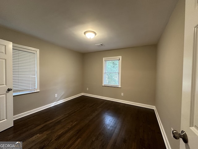 3168 Mcafee Rd, Decatur, GA 30032 - unfurnished room featuring baseboards and dark wood-style floors