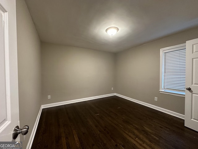 3168 Mcafee Rd, Decatur, GA 30032 - empty room with dark wood-style flooring and baseboards