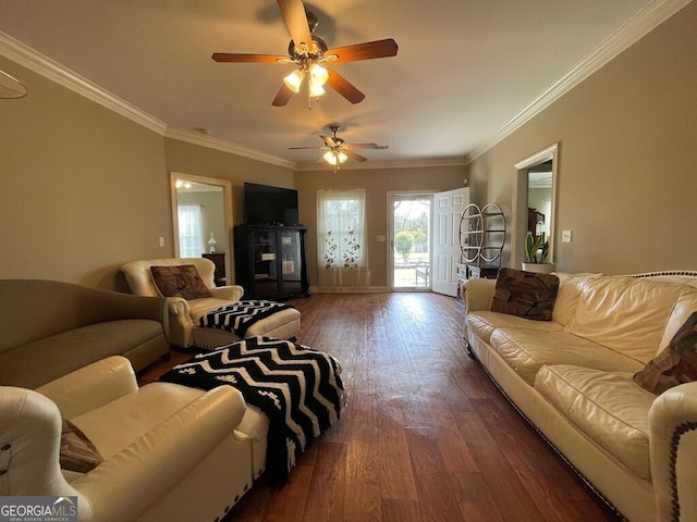 living room with dark wood-type flooring, ceiling fan, and crown molding