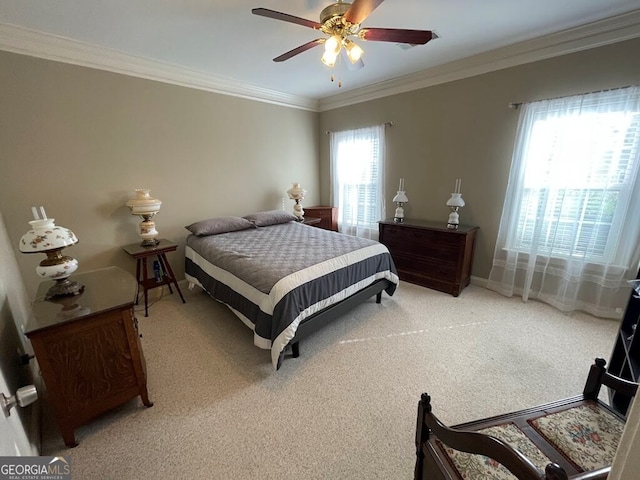 bedroom with crown molding, carpet, multiple windows, and ceiling fan