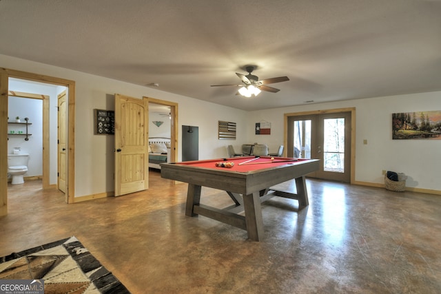 recreation room with french doors, a textured ceiling, concrete flooring, billiards, and ceiling fan