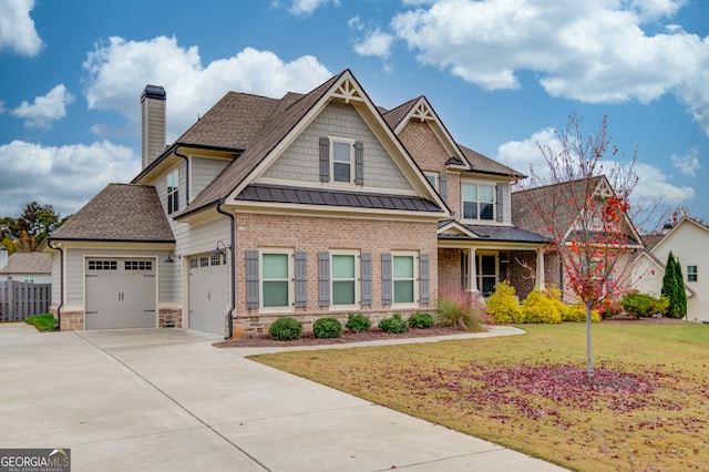 craftsman inspired home featuring a front lawn