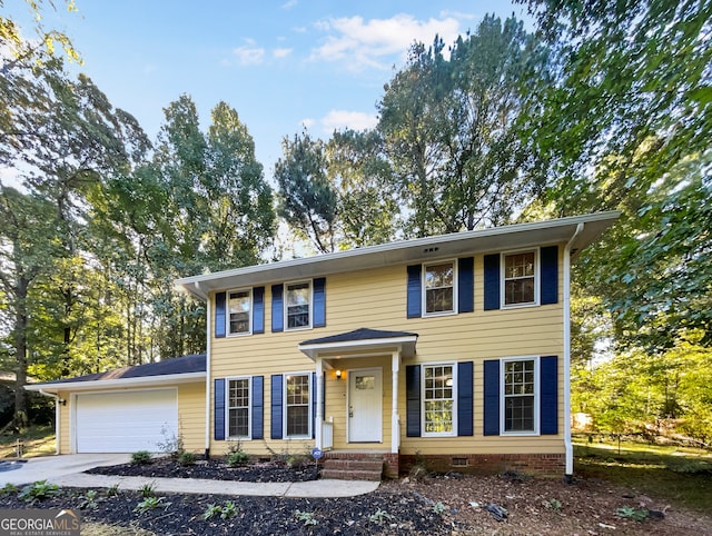 colonial home featuring a garage