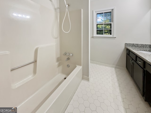 bathroom with vanity, tile patterned flooring, and shower / bathing tub combination