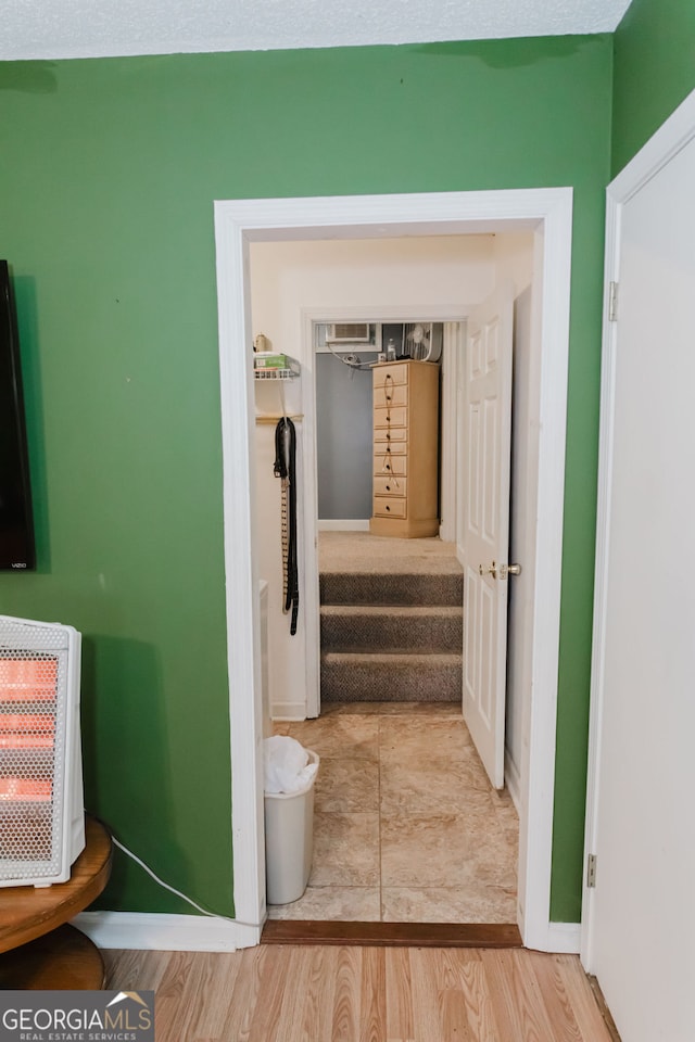 bathroom with hardwood / wood-style floors