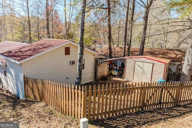 exterior space featuring a storage shed