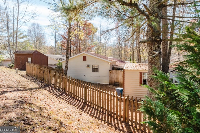 exterior space featuring a storage shed