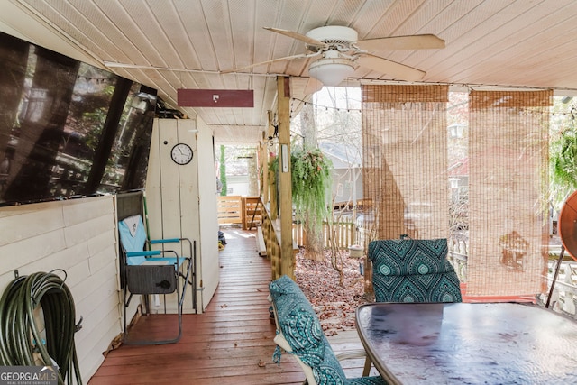 interior space featuring hardwood / wood-style flooring and ceiling fan