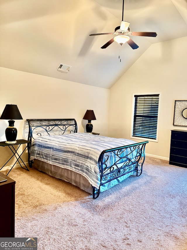 carpeted bedroom featuring lofted ceiling and ceiling fan