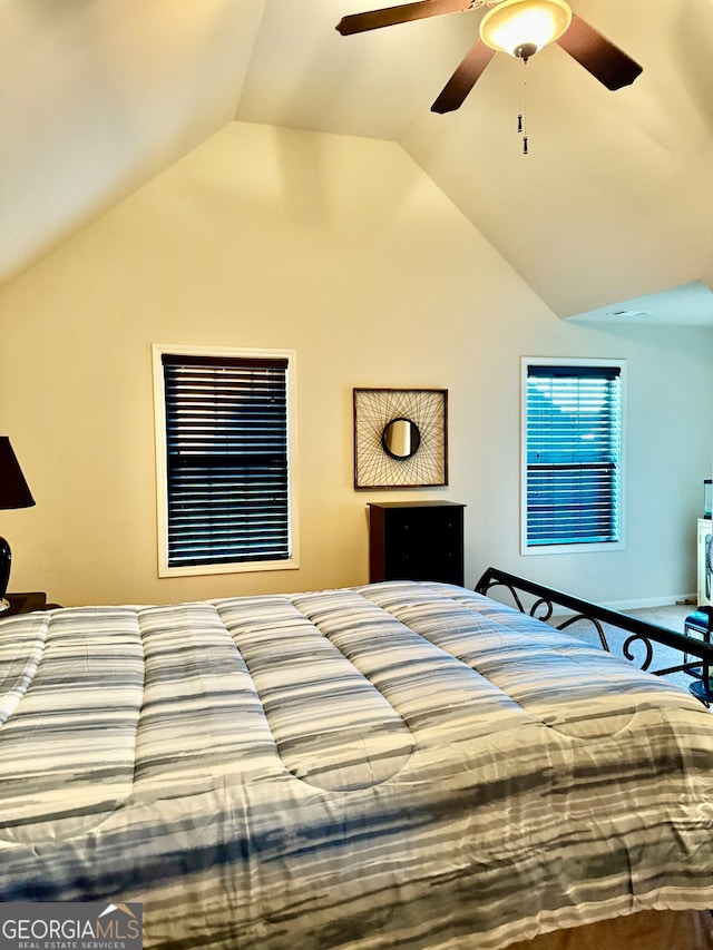 bedroom with vaulted ceiling and ceiling fan