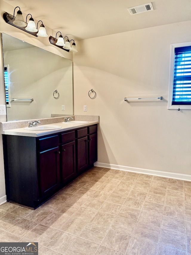 bathroom featuring vanity