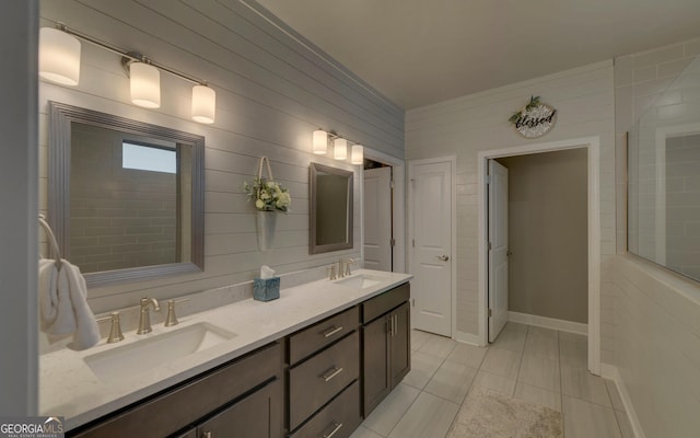 bathroom featuring tile patterned flooring and vanity