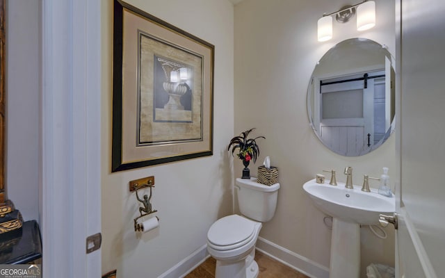 bathroom featuring toilet