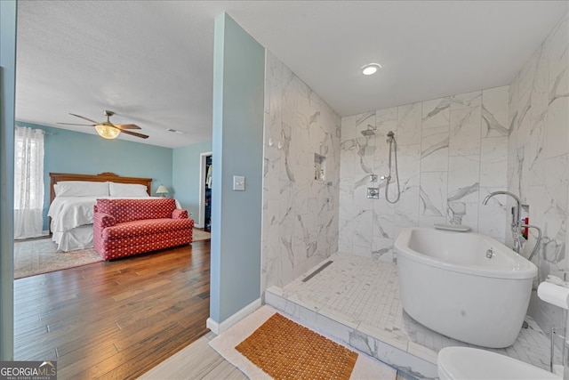 bathroom with independent shower and bath, toilet, ceiling fan, and wood-type flooring