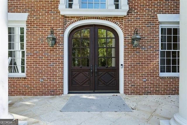 doorway to property with french doors