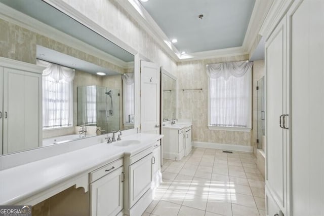 bathroom featuring tile patterned floors, crown molding, vanity, and an enclosed shower