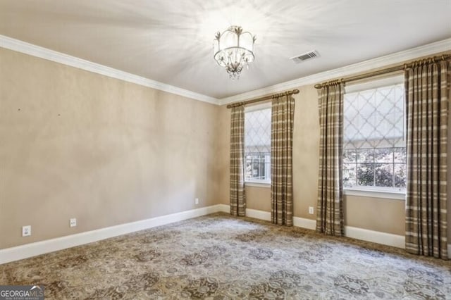 unfurnished room featuring a notable chandelier and ornamental molding