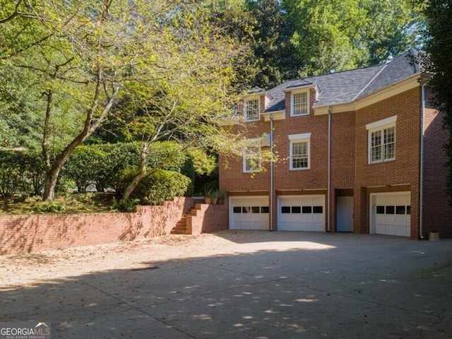 view of front of property with a garage